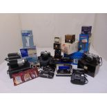 A quantity of cameras, lenses and accessories to include Olympus, C + C underwater camera, flash
