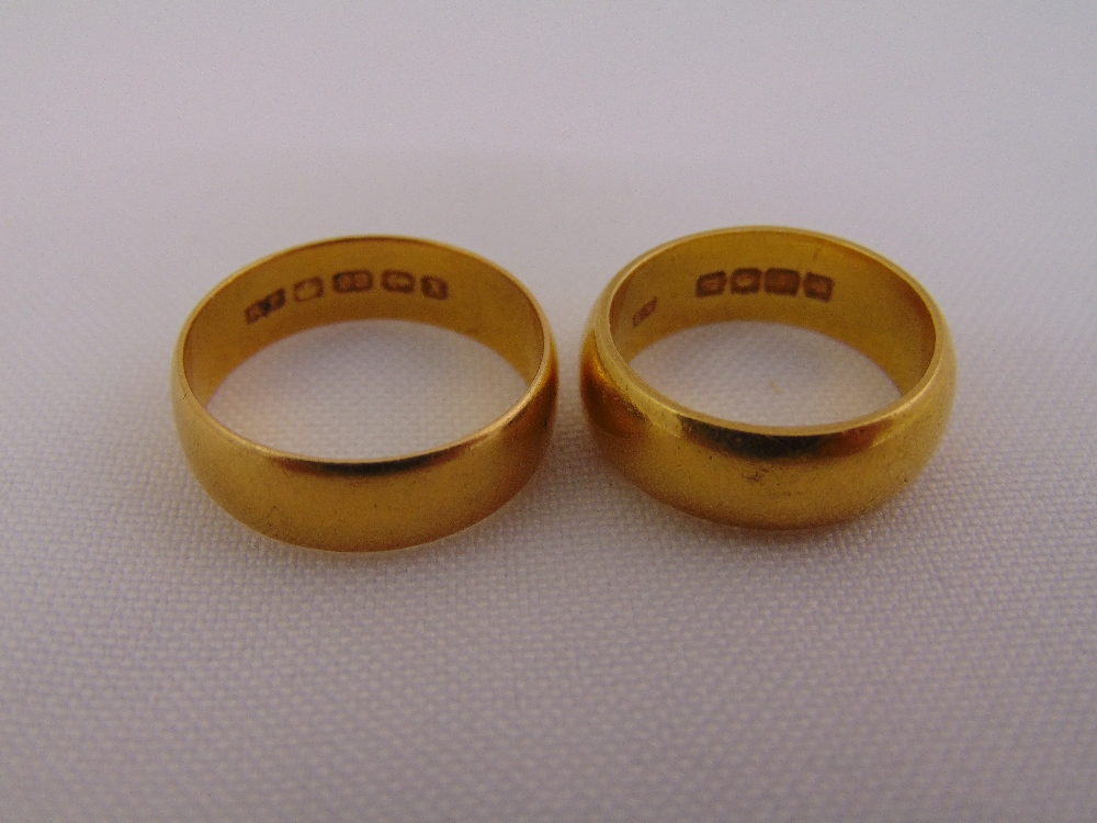 Two 22ct yellow gold wedding bands, approx total weight 15.9g