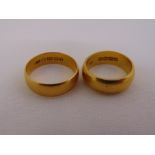 Two 22ct yellow gold wedding bands, approx total weight 15.9g