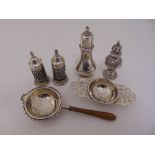 A quantity of silver to include a silver salt and pepper with blue glass liners, two pepperrettes