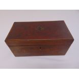 An Edwardian mahogany rectangular tea caddy with satinwood stringing to inside and hinged covered,