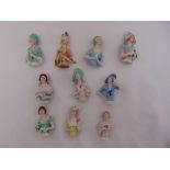 A quantity of German late 19th and early 20th century polychromatic porcelain half dolls (10)