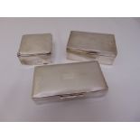 Two hallmarked silver cigarette boxes and a silver plated cigarette box (3)