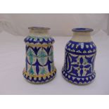 Two blue and white Iznick vases, cylindrical form decorated with stylised geometric forms, 17cm (h)