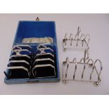 A pair of George V silver five bar toast racks in presentation case, Birmingham 1913 and a pair of
