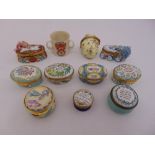 A quantity of porcelain and enamel Halcyon days pill and patch boxes, a Goss style loving cup and