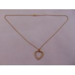 14ct yellow gold chain with a heart shaped pendant, approx total weight 6.9g