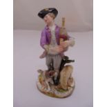 Meissen 19th century figurine of a Shepherd with bagpipes, a dog and a lamb, slight loss to foliage,