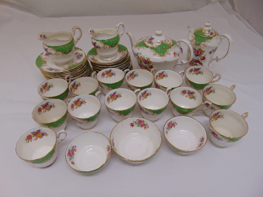 Paragon porcelain Green Rockingham design tea service to include a teapot, a coffee pot, cups and