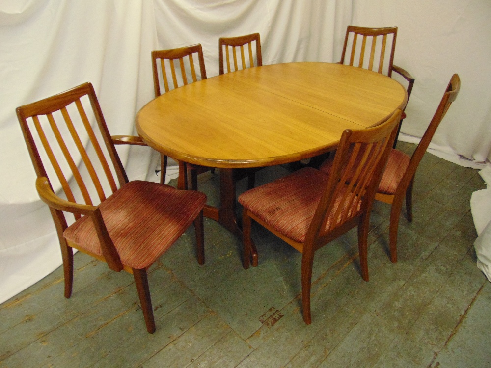 G-Plan teak oval dining table circa 1980 and six matching chairs, 72 x 107 x 209