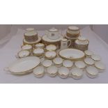 Minton Gold Rose dinner and tea service for twelve place settings to include plates, bowls,