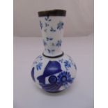 An early 20th century blue and white milk glass vase decorated with flowers and leaves, 19cm (h)