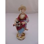 Meissen early 19th century figurine of the female Malabar musician, marks to the base, 18cm (h)