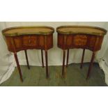 A pair of mahogany kidney shaped side tables with scroll pierced gallery tops each with three