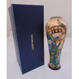 Moorcroft baluster vase decorated with flowers and a bridge, marks to the base, in original