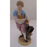 Meissen figurine of a man in period costume cutting wood, restoration to the stick in the right