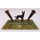An Art Deco rectangular desk pen stand with applied bronze figurine of a dog mounted on an onyx