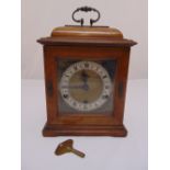 A Garrard mahogany cased chiming bracket clock with silvered dial and Roman numerals, 31 x 22 x