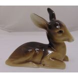 Midwinter figurine of a recumbent fawn, marks to the base, 17 x 20cm