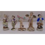 Five continental figurines of children in various forms, tallest 18cm (h)