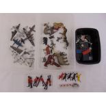 A quantity of play worn diecast to include soldiers, aeroplanes, street signs and animals