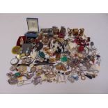 A quantity of silver and costume jewellery to include brooches, necklaces, pendants, earrings and