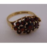 9ct yellow gold and garnet dress ring, approx total weight 3.4g