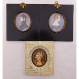 A pair of framed miniatures of a lady and gentleman in 19th century dress and another of a lady