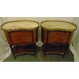 A pair of kidney shaped mahogany marble top side tables with pierced gilded metal galleries, the