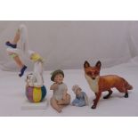 A Royal Doulton Tumbling figure HN3283, a Beswick figurine of a fox numbered 81 and two Bisque