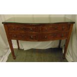 A rectangular mahogany canteen with lion mask handles, the four drawers revealing an extensive