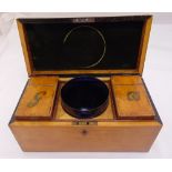 A Regency mahogany and satinwood rectangular tea caddy to include blue glass etched mixing bowl,