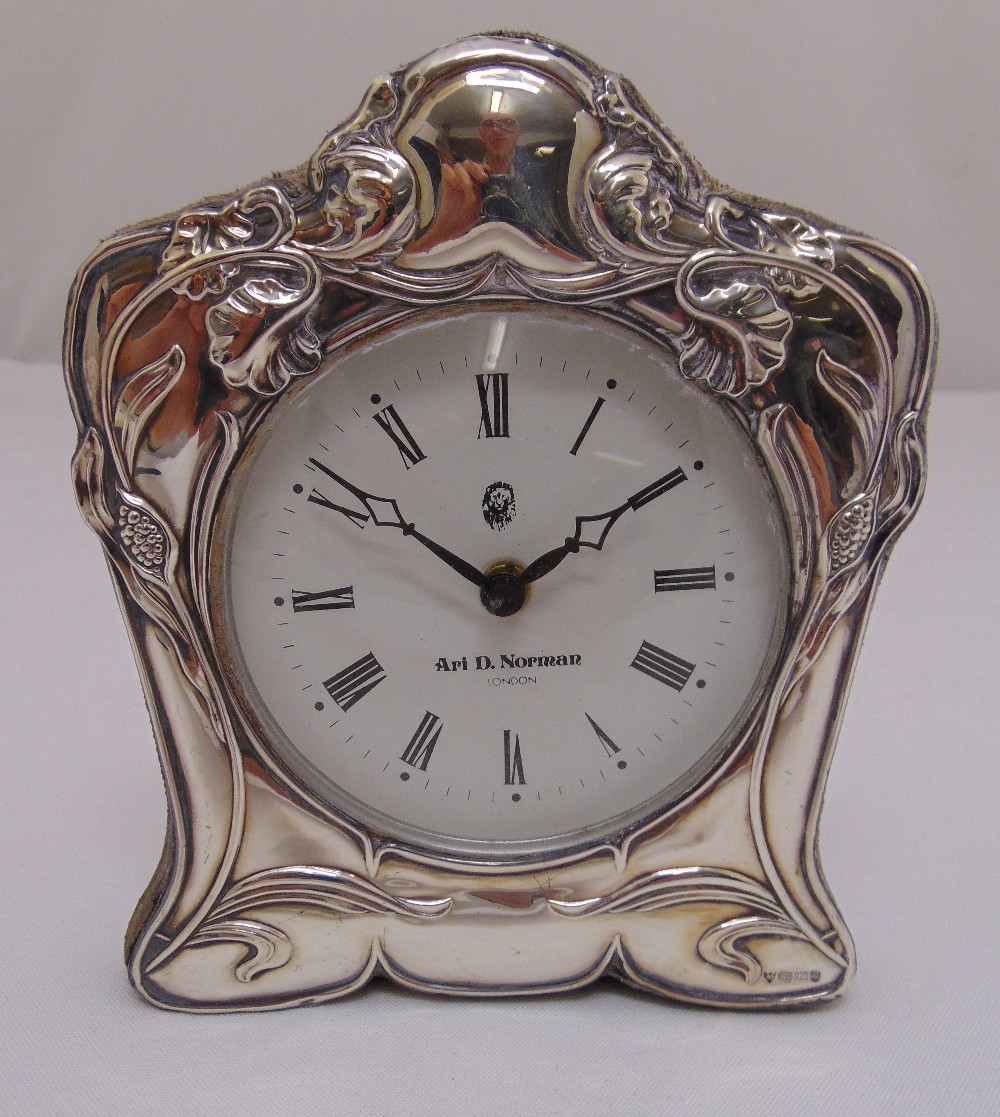 Ari D. Norman silver mounted desk clock decorated with flowers and leaves in the Art Noveau style,