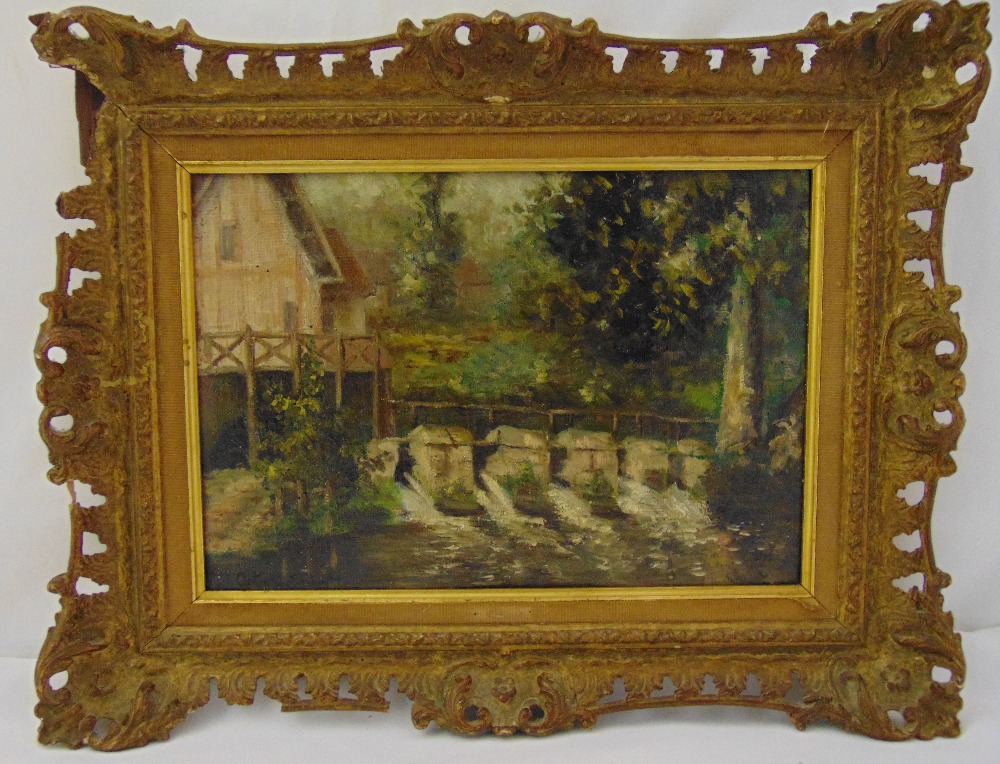 Louis Aston Knight framed oil on panel of cottages on a river bank, signed bottom right, label to