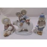 Three Lladro figural groups of Eskimos with polar bears, tallest 17cm (h)