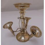 A late Victorian silver epergne with detachable scroll pierced trumpet form vases on raised circular