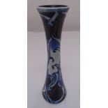 Moorcroft stem vase designed by Emma Bossons decorated with flowers, signed to the base, 31cm (h)
