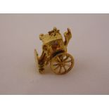 9ct yellow gold charm in the form of a handsome cab, approx total weight 4.0g