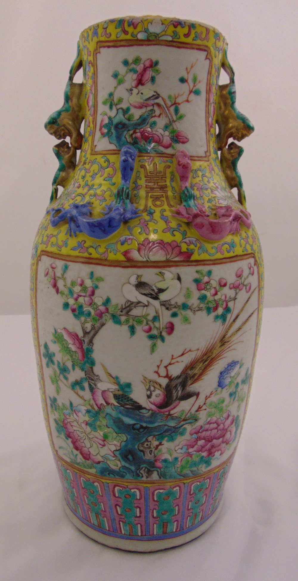 A Cantonese famile rose lamp base of circular form decorated with birds and blossoms, A/F, 43.5cm (