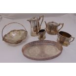A quantity of silver plate to include a four piece teaset, a gallery tray and a fruit stand