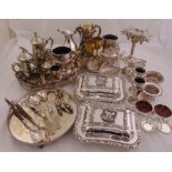 A quantity of silver plate to include a pair of entree dishes and covers, wine coasters, trays and a