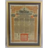 A framed and glazed Chinese Government bond certificate with 43 coupons, 45 x 33cm