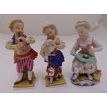 Three continental porcelain figurines of children at play, 10cm (h)