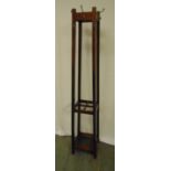 An oak hat, coat and umbrella stand, rectangular with applied coat hooks, 174cm (h)