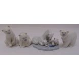 Four Lladro figurines of polar bears in various positions