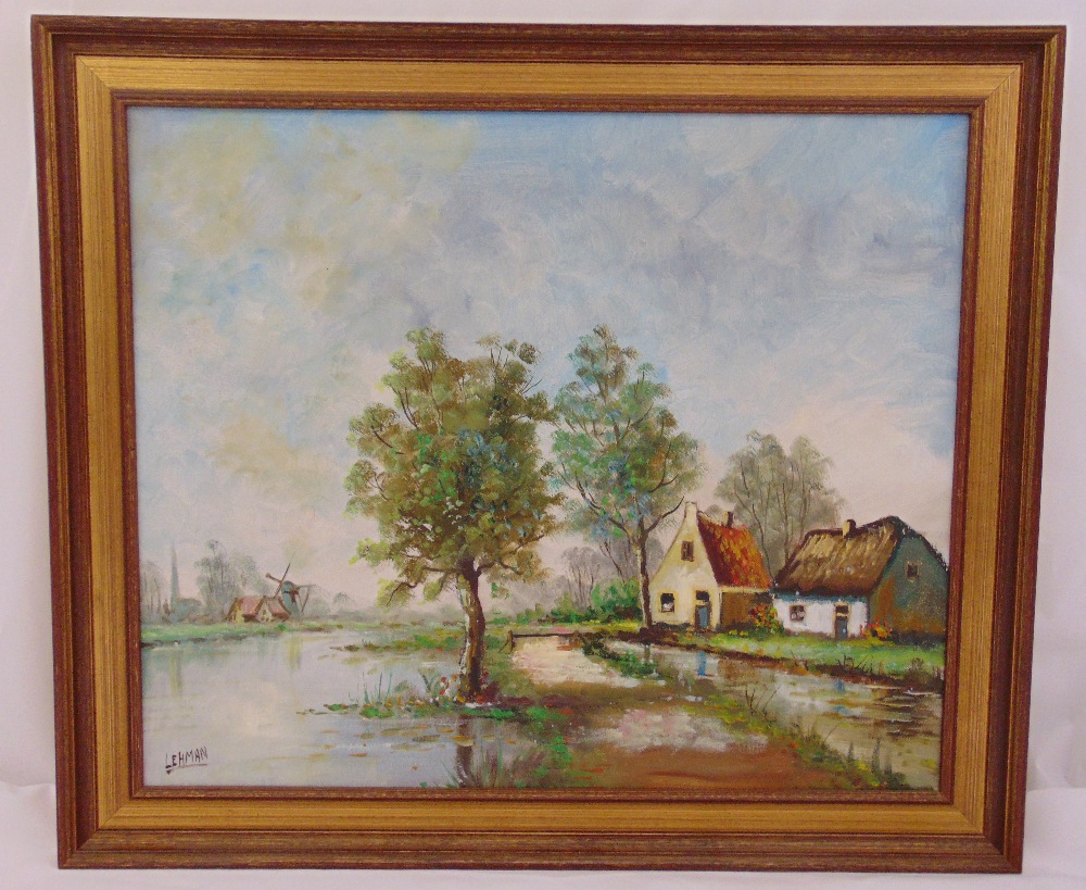 Lehman framed oil on canvas of houses by a canal, signed bottom left, 51x 61cm