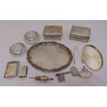 A quantity of silver plate to include a tray, rectangular covered boxes and two dishes (12)