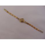 9ct yellow gold ladies wristwatch on a 9ct gold bracelet, approx total weight 11.3g