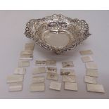 Silver hallmarked bonbon dish and twenty six white metal miniature flags of the world, approx