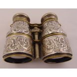 A pair of Victorian silver opera glasses, chased with flowers, scrolls and leaves, Birmingham 1894